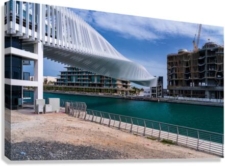 Dubai Water Canal bridge twists towards new apartment blocks  Canvas Print