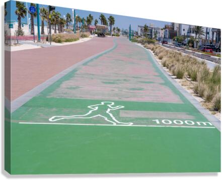 Rubber surface of running track alongside Dubai beach  Impression sur toile