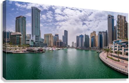 Modern buildings crowd the waterfront at Dubai Marina UAE  Canvas Print