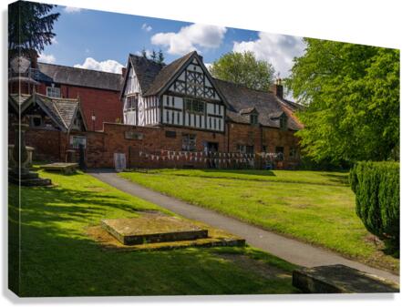 Old School House building in graveyard in Oswestry  Canvas Print