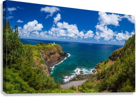 Kilauea lighthouse on headland against blue sky on Kauai  Canvas Print