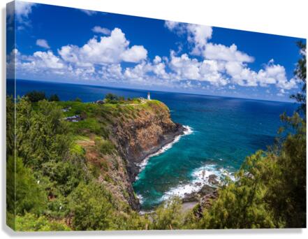 Kilauea lighthouse on headland against blue sky on Kauai  Canvas Print