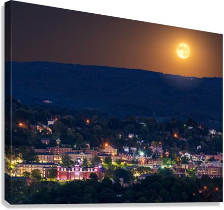 Supermoon rises in the sky above Morgantown in West Virginia  Canvas Print