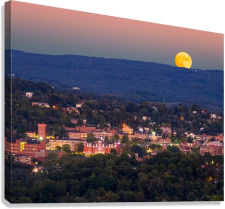 Supermoon rises in the sky above Morgantown in West Virginia Canvas Print