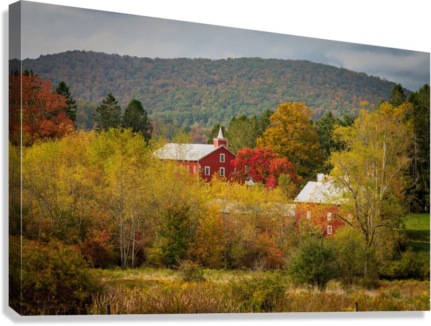 Historic red barn and farm nestled in fall colors in West Virgin Canvas Print