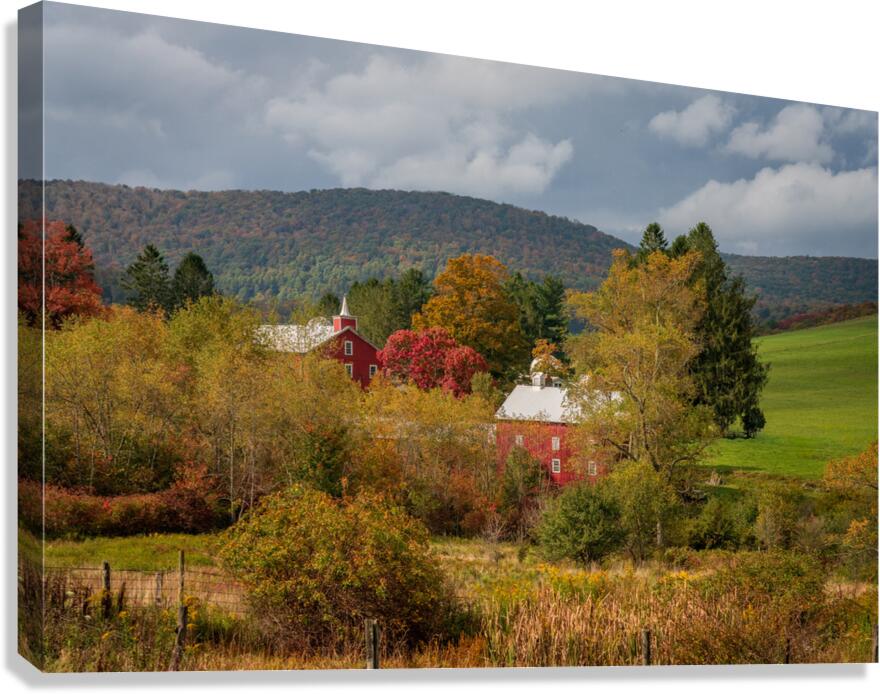 Historic red barn and farm nestled in fall colors in West Virgin  Canvas Print