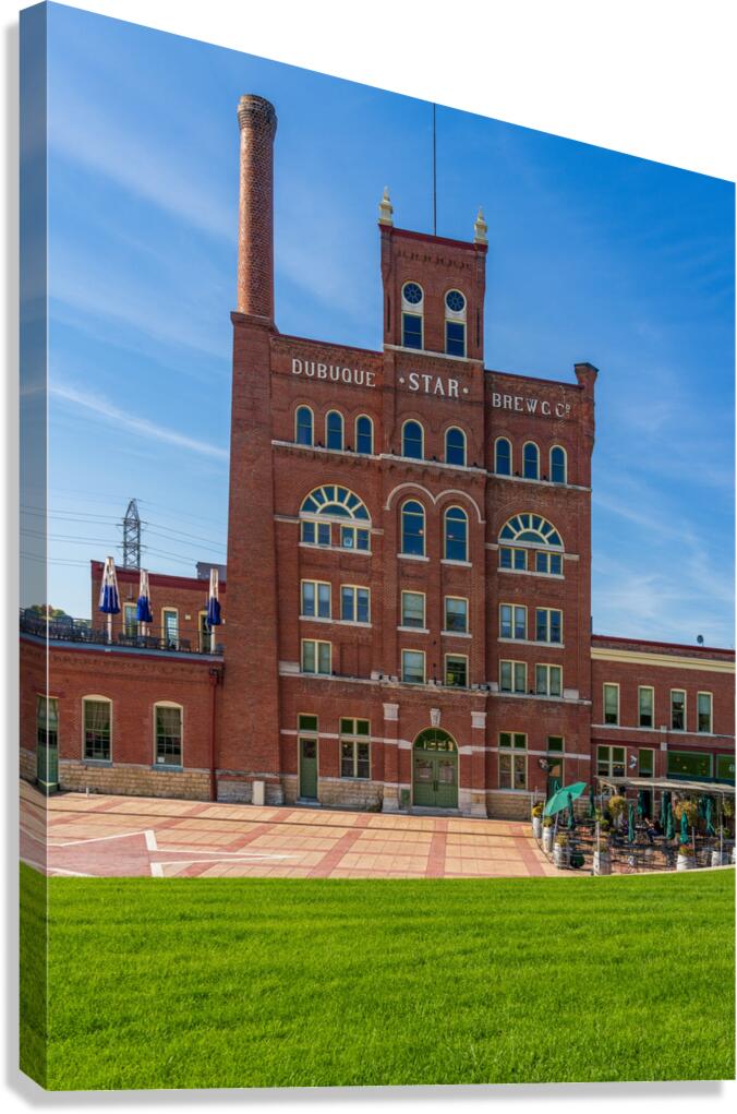 Historic Dubuque Star Brewery alongside Mississippi river  Canvas Print