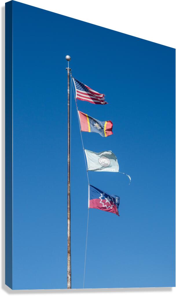 Flagpole with multiple flags in the small town of Greenville MS  Impression sur toile