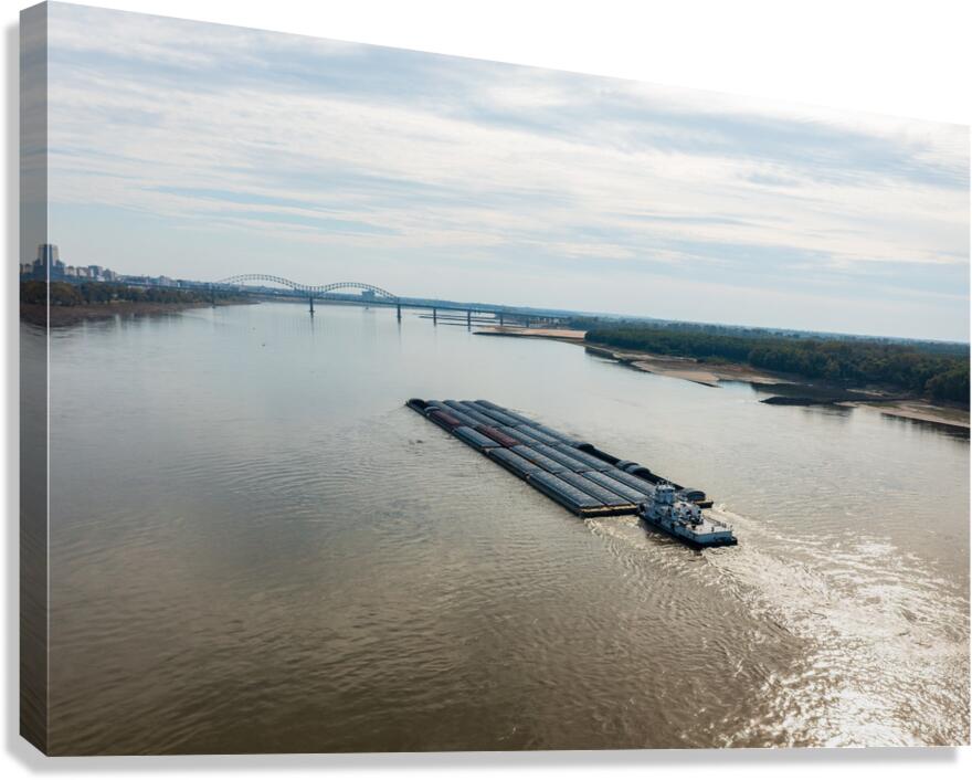 Large barge boat sails under Memphis bridge in October 2023  Canvas Print