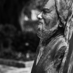 Statue of Gerald Durrell in Corfu in black and white