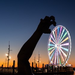 Ferris wheel and The Awakening sculpture