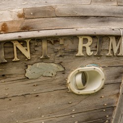 Detail of abandoned fishing boat by ocean at Icy Strait Point