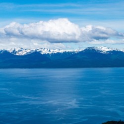 Broad panorama of the mountain range at Icy Strait Point in Alas