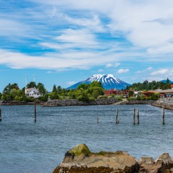 Mt Edgecumbe rises about the small town of Sitka in Alaska