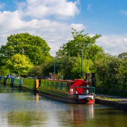 Colorful canal narrowboats in Ellesmere in Shropshire