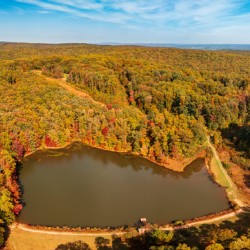 Aerial fall leaves around Coopers Rock reservoir in WV