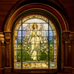The Angel among the Lilies. Tiffany stained glass window. 1896