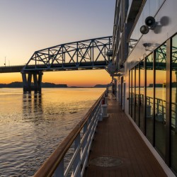 River cruise boat sails to Mark Twain Memorial road bridge