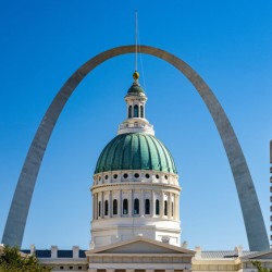 Dome of Old Courthouse in St Louis Missouri against Gateway arch