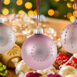 Three Christmas decorations on strings