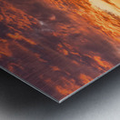 Dramatic sunset reflected in the smooth ripples of a lake or oce Impression metal