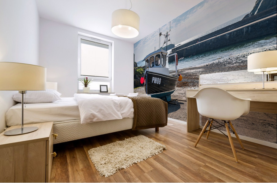 Fishing boat in old harbour at Mullion Cove in Cornwall Mural print