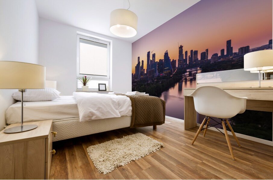 Orange skies behind skyline of Austin Texas as sun starts to ris Mural print