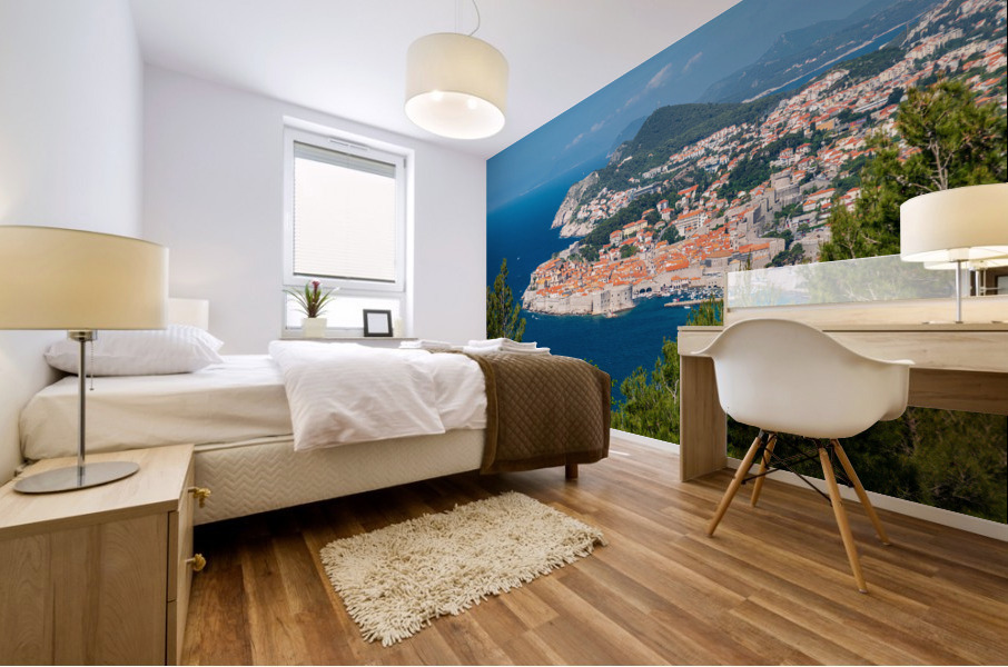 Fortress town of Dubrovnik in Croatia framed by trees Mural print