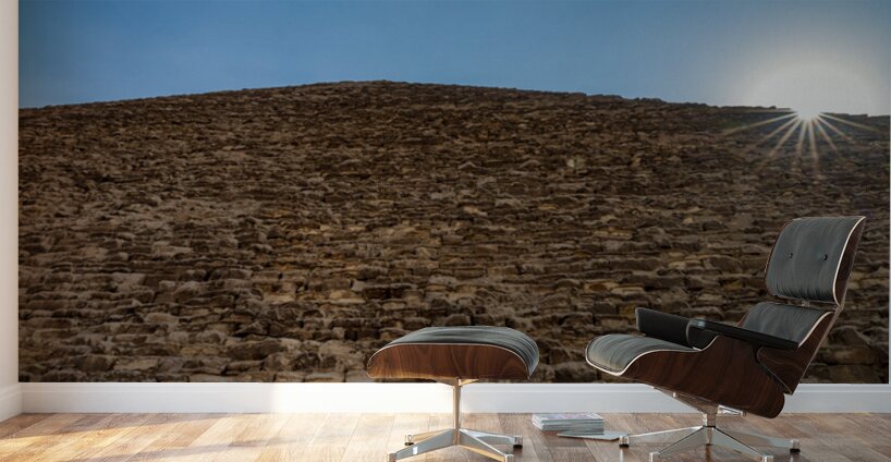 Great Pyramid of Giza with the sun flaring over the top edge Wall Murals