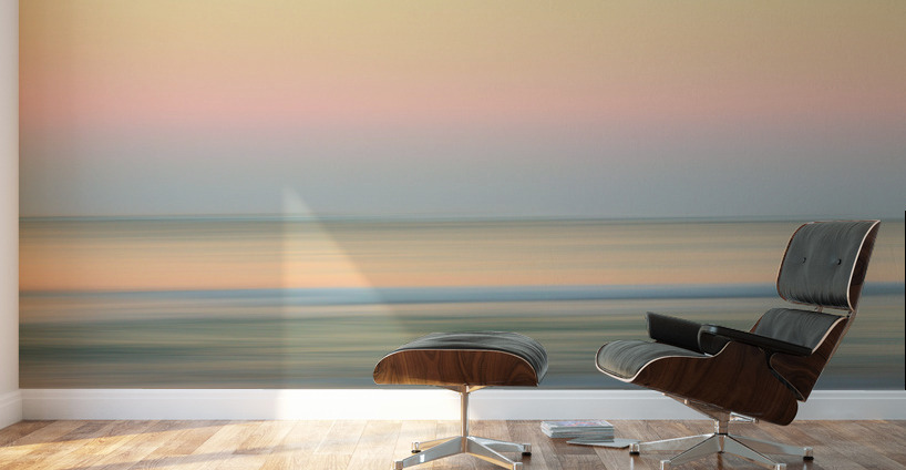 Sunrise over ocean with sideways pan Wall Murals