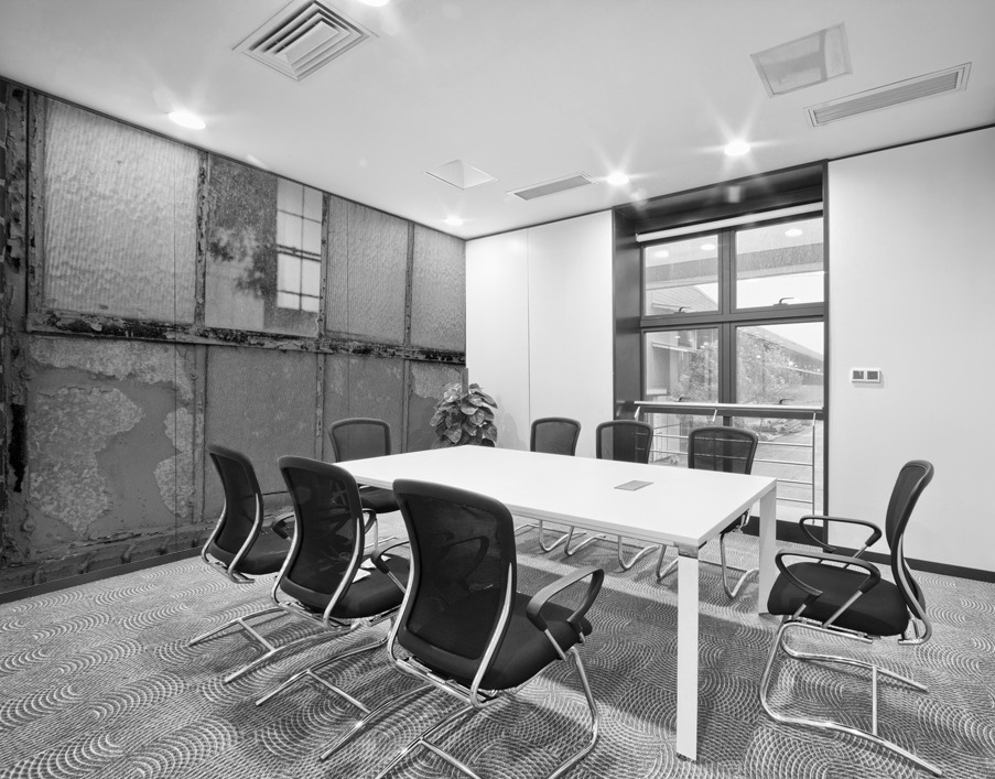 Old rusty window in warehouse in black and white Wall Printing