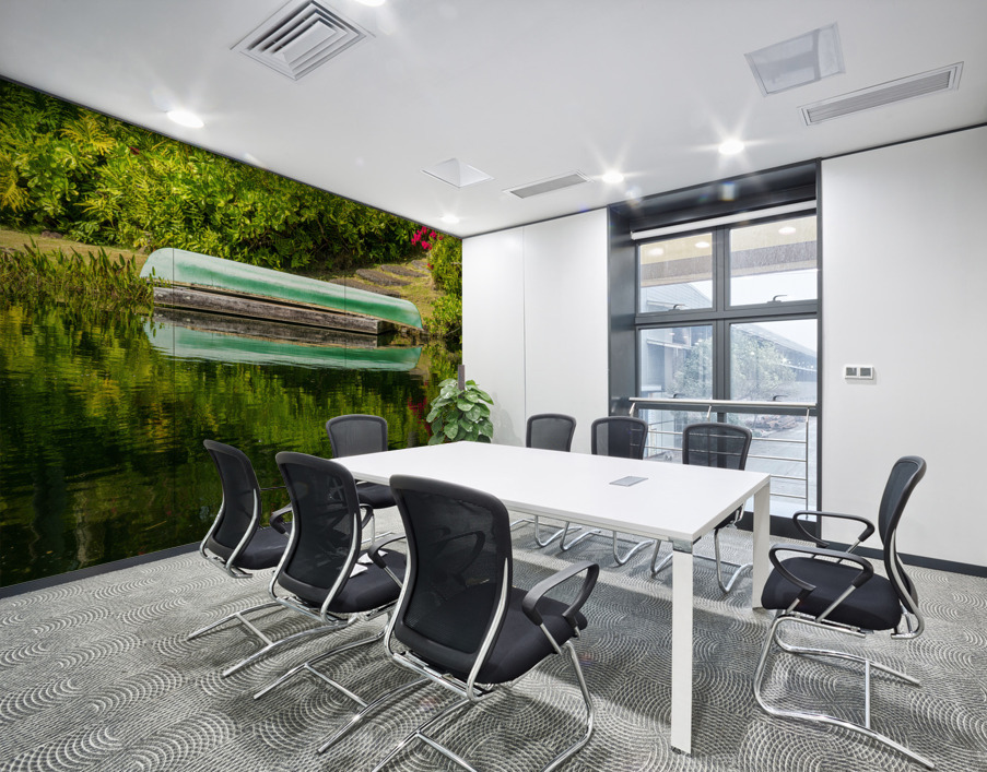 Green canoe on dock reflecting into calm lake or pond in garden Wall Printing
