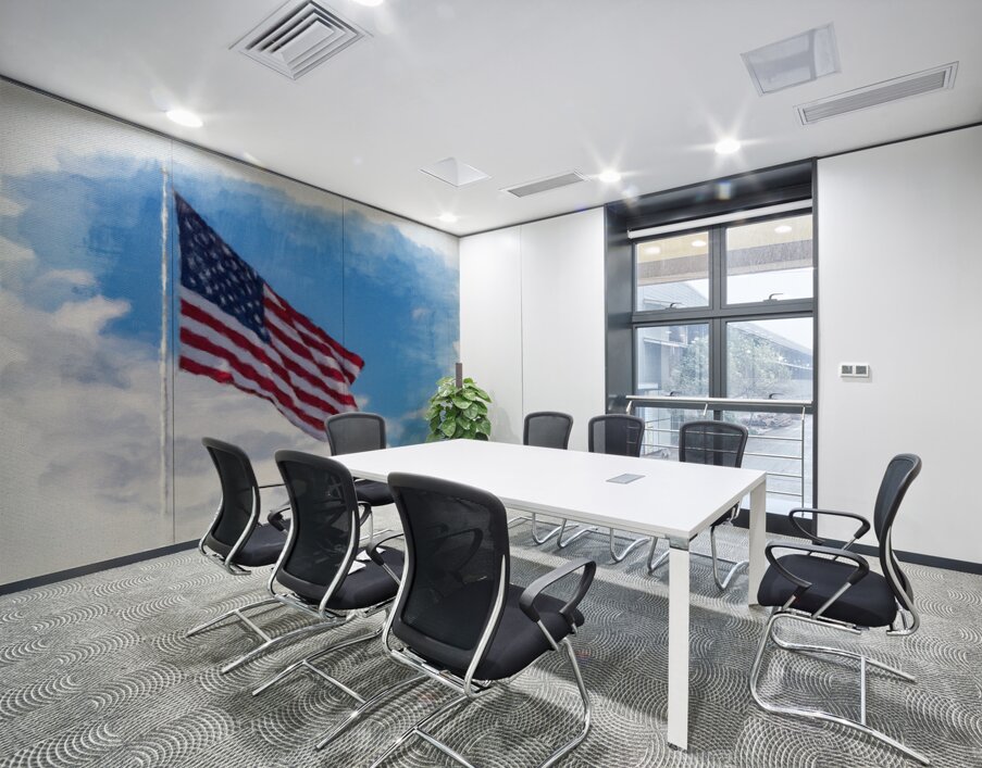 Digital art of USA stars and stripes flag against blue sky Wall Printing