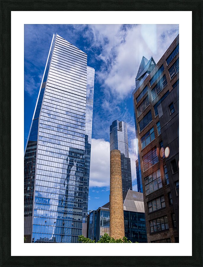 Looking up at modern buildings by brick chimney in Hudson Yards Picture Frame print