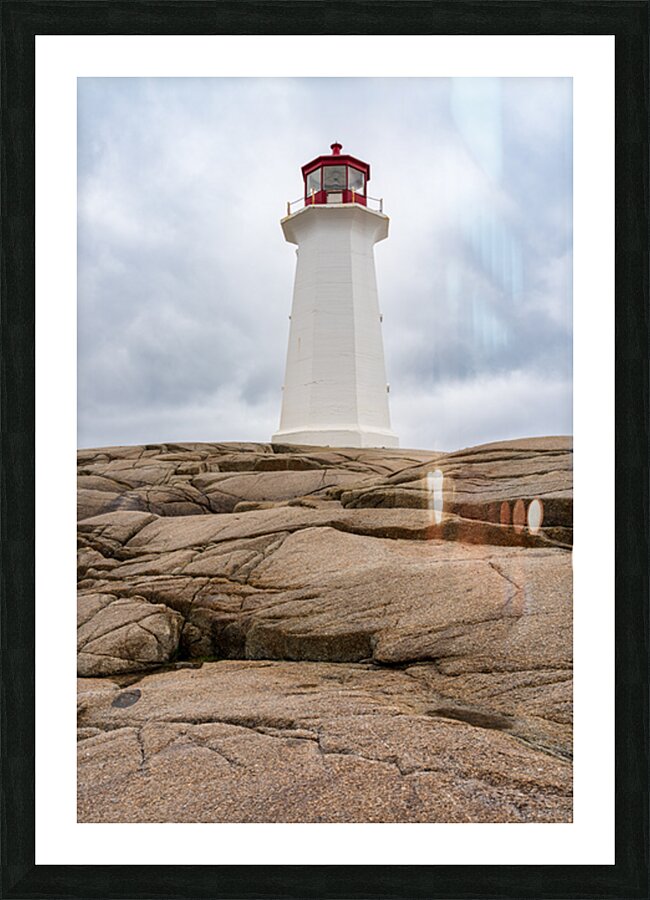 Famous Peggys Cove lightouse near Halifax in Nova Scotia Canada Picture Frame print