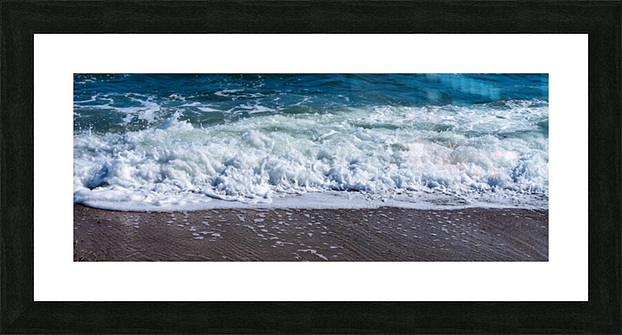 Frozen motion of waves crashing onto a pebble beach on the Isle  Picture Frame print