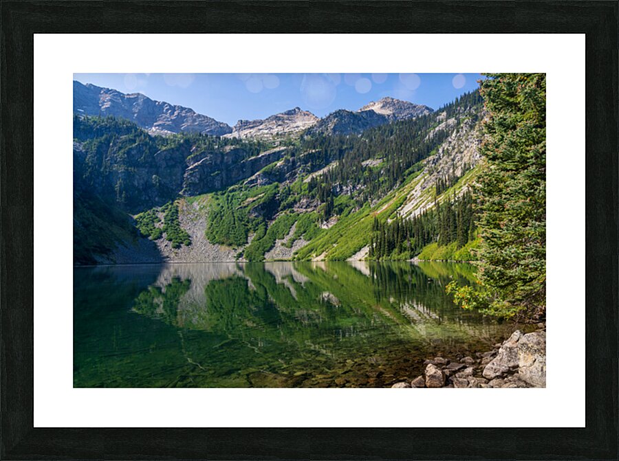 Mirror image reflection of Rainy Lake in North Cascades National Picture Frame print