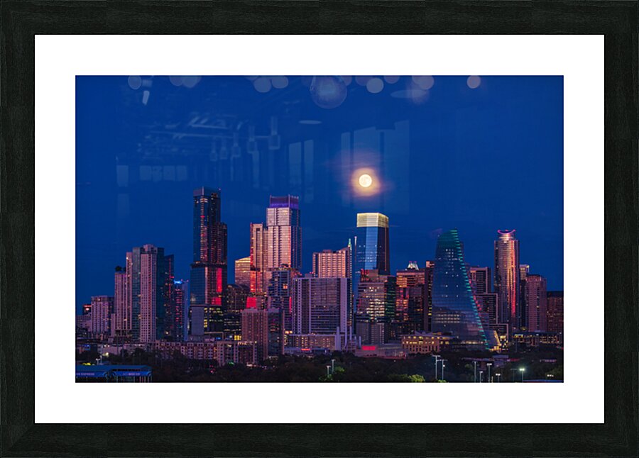 Harvest moon in the Austin skyline at sunset in Texas Picture Frame print