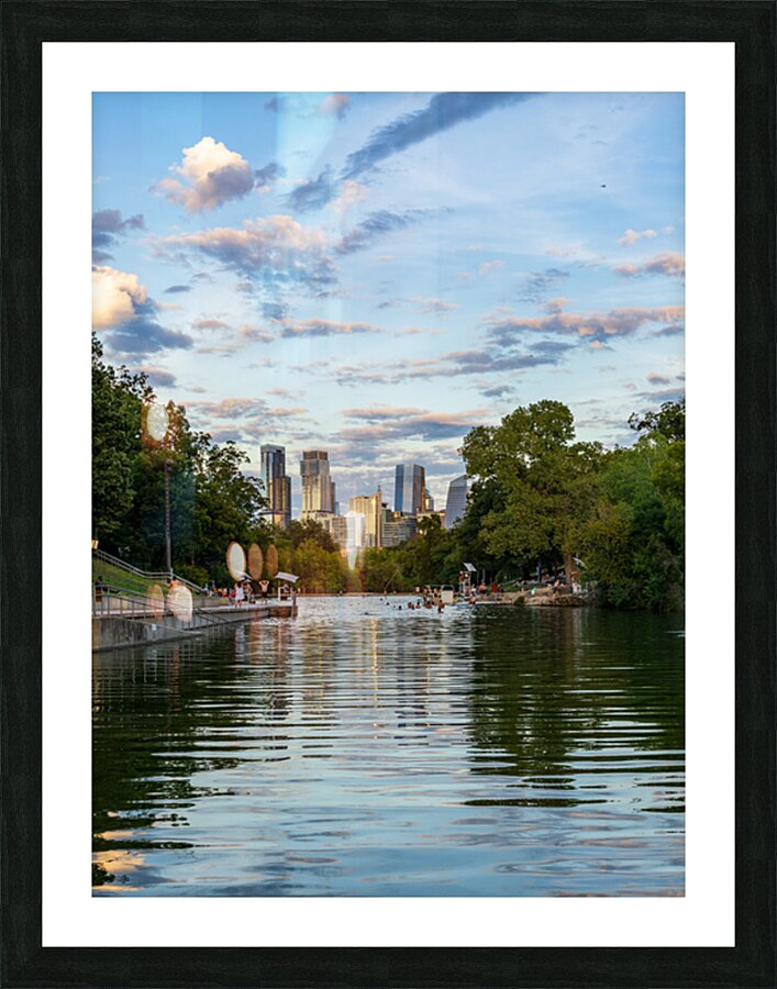 View of the Austin skyline at sunset over Barton Springs swimmin Picture Frame print
