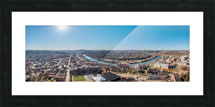 Aerial drone panorama of the downtown and university in Morgantown West Virginia  Framed Print Print