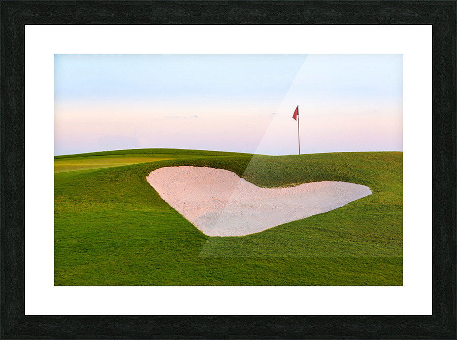 Heart shaped sand bunker in front of golf green Picture Frame print