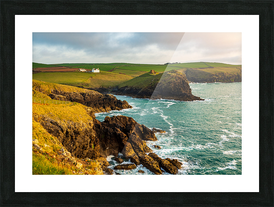 Coastline in late evening sun at Port Quin Frame print