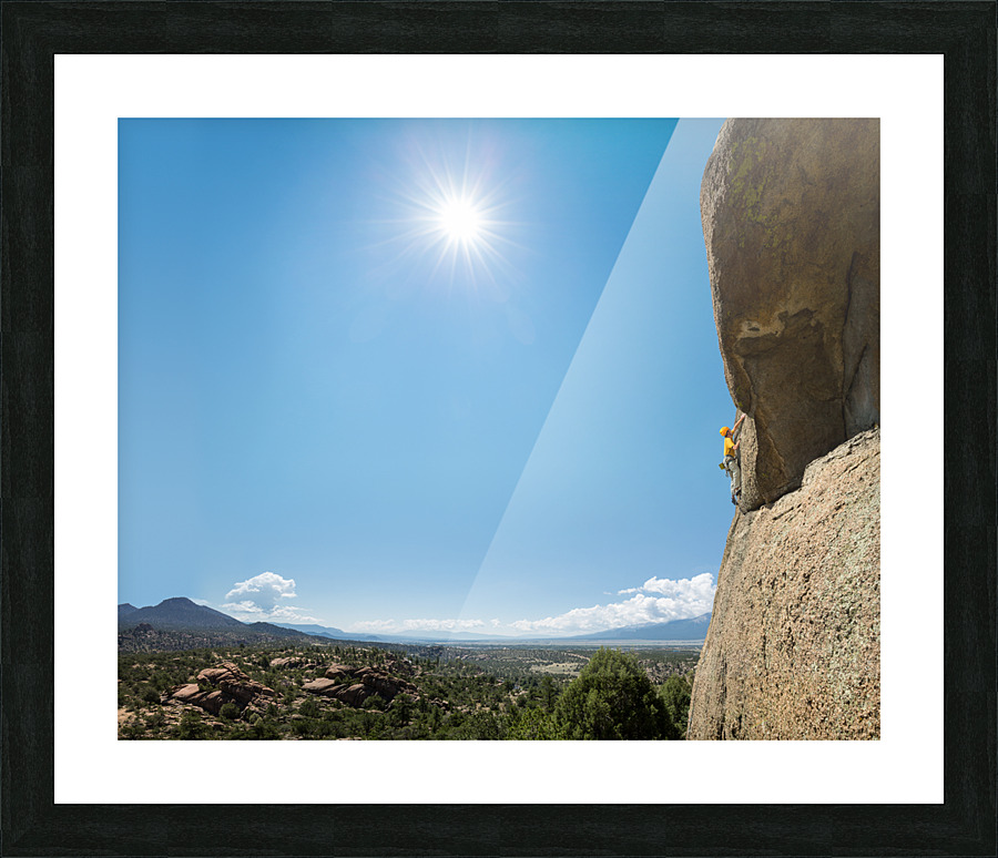 Senior man on steep rock climb in Colorado  Framed Print Print