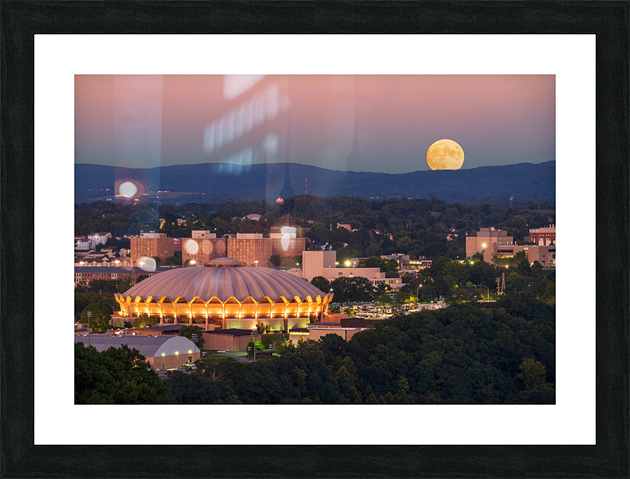 Moon rising above the Coliseum at WVU  Framed Print Print
