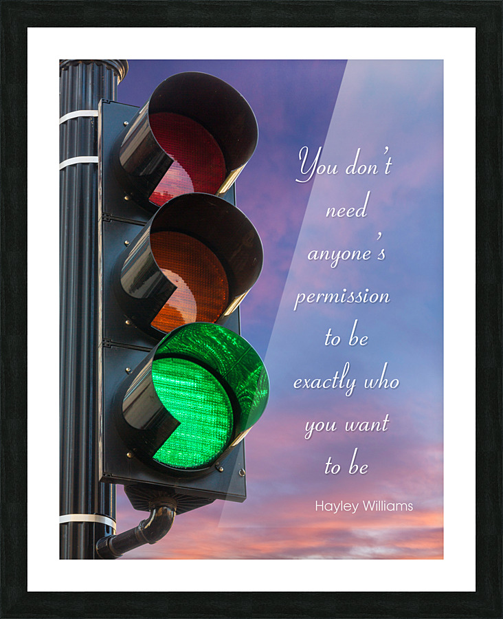 Green light on traffic signal against sunrise as concept  Framed Print Print