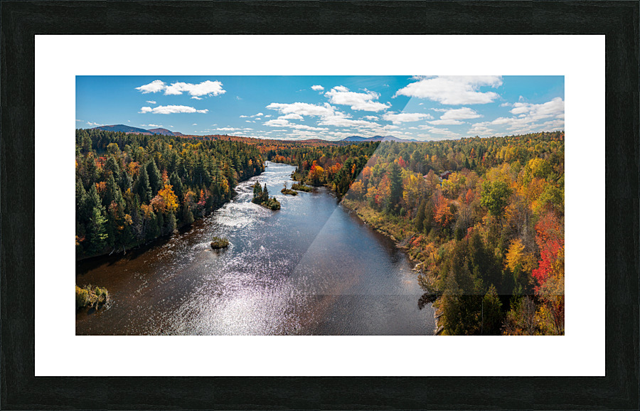 Saranac river flows through multi-colored fall landscape in Adir  Framed Print Print