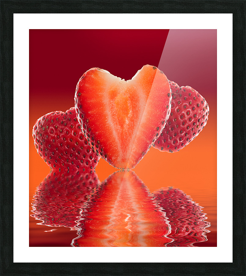Fresh sliced strawberry in heart shape reflected  Framed Print Print