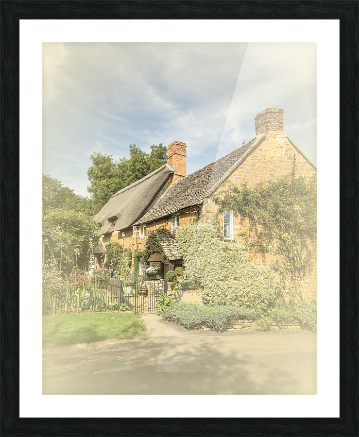 Faded cotswold stone house in Ilmington Picture Frame print