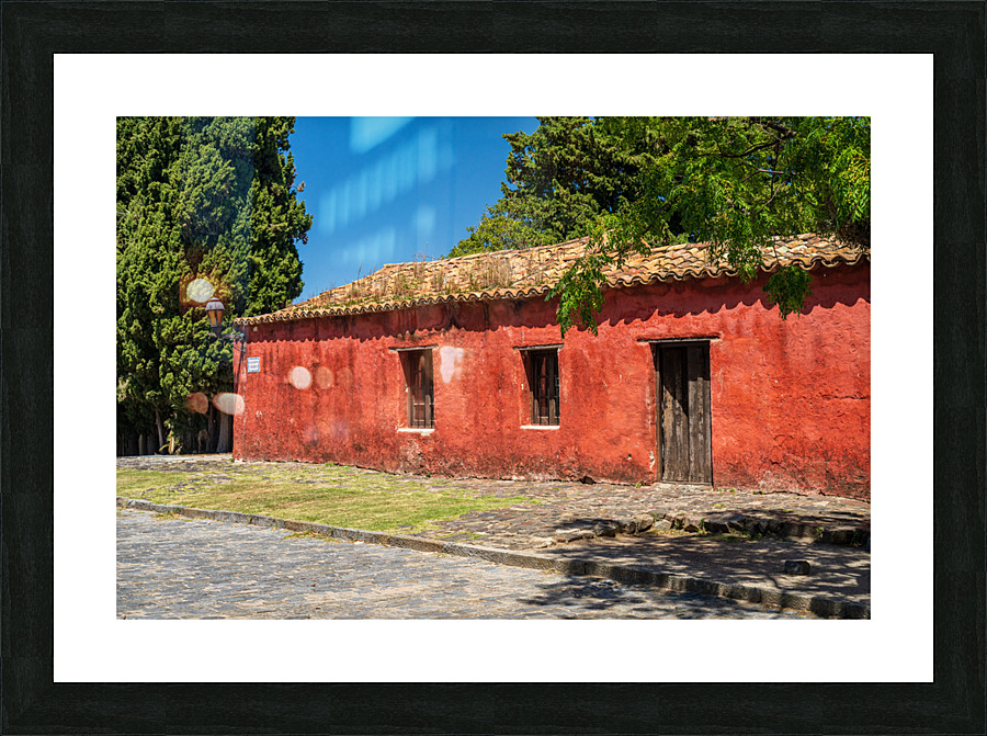 Red house in Unesco historical town of Colonia del Sacramento  Framed Print Print