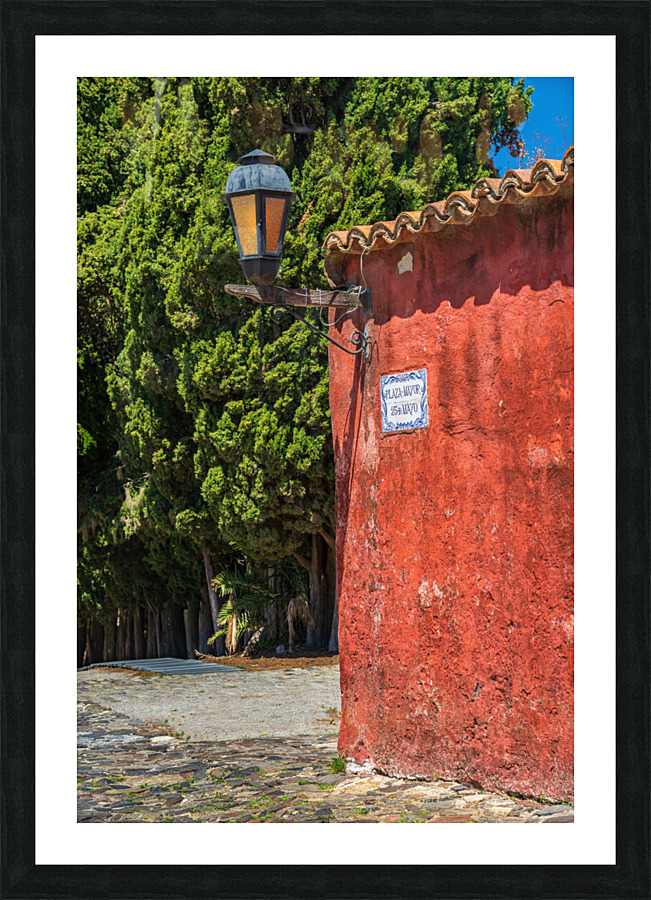 Street lamp in Unesco historical town of Colonia del Sacramento  Framed Print Print